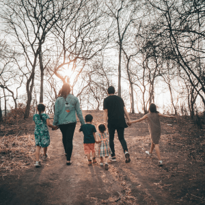 Family walking in the woods