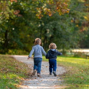 Human Design Gate 37 - The Gate of Friendship.  Two young friends walking together